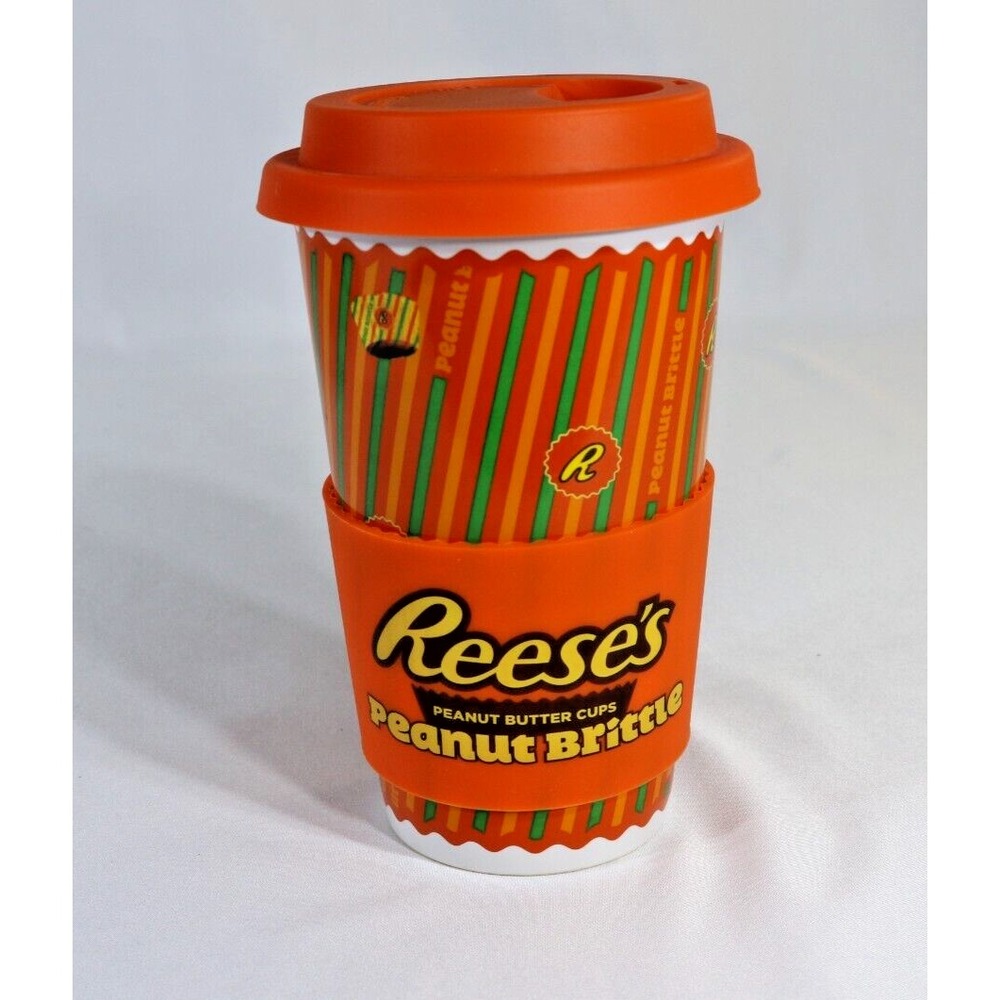 Galerie Reeses Peanut Brittle Ceramic Travel Mug Orange Silicone Lid Sleeve Cup
